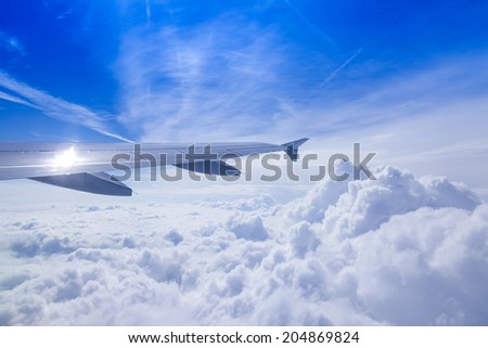 View of clouds from a plane window