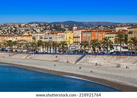 Nice, France, on October 16, 2012. View of the English promenade (Promenade des Anglais) and beach. Promenade des Anglais in Nice - one of the most beautiful and known embankments in Europe