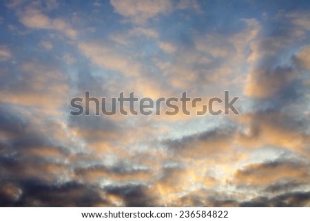 Heavenly landscape. The clouds which are picturesquely lit with decline beams