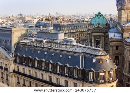 Paris, France, on March 25, 2011. An urban view from a survey terrace of Gallery Lafayette. Roofs of Paris