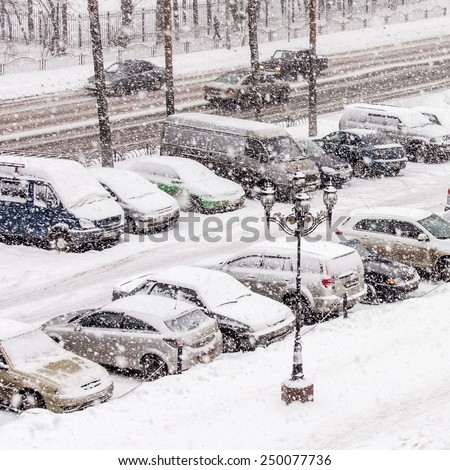 Pushkino, Russia, on February 2, 2015. A view of a parking in the inhabited massif in blizzard time