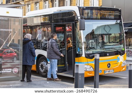 Nice, France, on March 10, 2015. Passengers enter the bus going to the airport