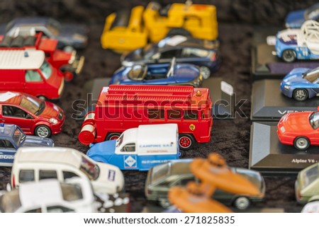Nice, France, on March 9, 2015. Vintage models of cars on a counter of a flea market on Cours Saleya Square. The Marche Du Cours Saleya market - one of the most known sights of Nice