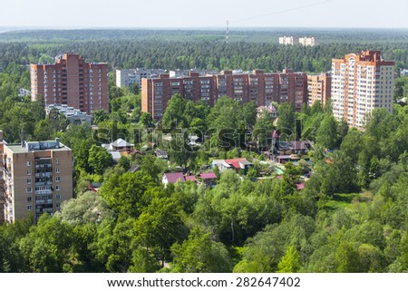 PUSHKINO, RUSSIA - on MAY 26, 2015. New multistoried houses on the river bank of Serebryank