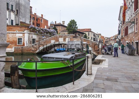 VENICE, ITALY - on MAY 1, 2015. The solution of household problems in island part of the city: garbage removal by the special boat