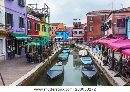 VENICE, ITALY - on APRIL 30, 2015. Burano the island, the street canal and multi-colored houses on the embankment.