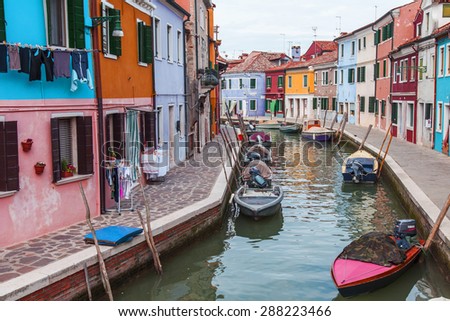 VENICE, ITALY - on APRIL 30, 2015. Burano the island, the street canal and multi-colored houses on the embankment.
