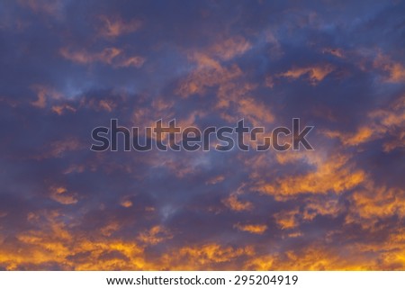 Sky at sunset. The clouds which are picturesquely lit with the setting sun
