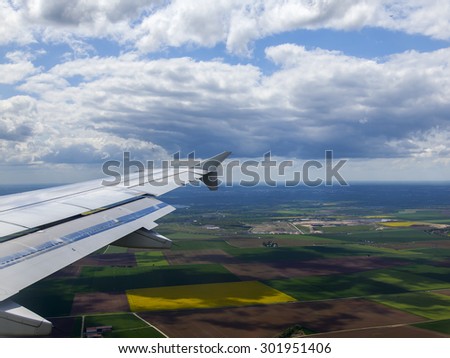 The top view from a window of the flying plane