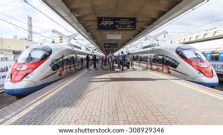 MOSCOW, RUSSIA, on AUGUST 19, 2015. Leningrad station. Two modern high-speed trains Sapsan near a platform expect departure to St. Petersburg