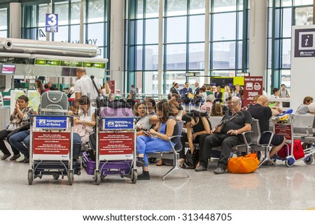 ROME, ITALY, on AUGUST 25, 2015. Fyumichino's airport, hall of departures. Passengers expect the announcement of the beginning a boarding in the plane