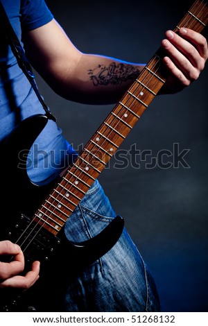 stock photo man playing rock on electric guitar Save to a lightbox 