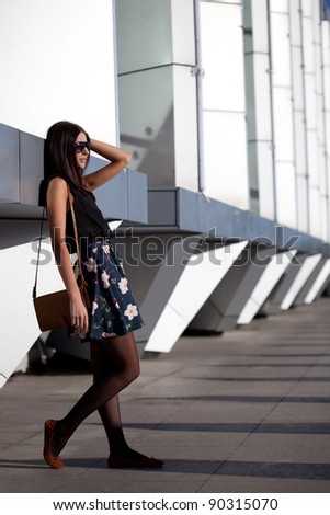 woman with leather bag, urban style