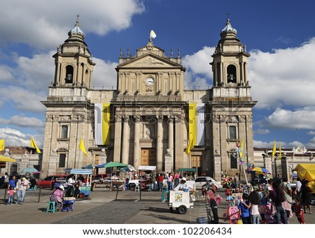 GUATEMALA CITY, GUATEMALA-JAN 3: Activity in front of the Guatemala Metropolitan Cathedral in Plaza Mayor on Jan 3, 2012.  This is the main church of Guatemala City and of the Archdiocese of Guatemala