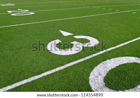 An empty high school football field