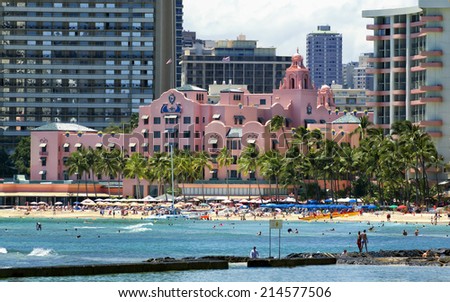 WAIKIKI, HAWAII - MAY 11, 2013: The Royal Hawaiian, pictured here on May 11, 2013, was one of the first hotels established in Waikiki, and is considered a flagship hotel in Hawaii tourism.