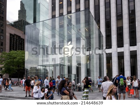 NEW YORK CITY - AUGUST 30: The Apple Store cube on 5th Avenue New York, on August 30th, 2014.the store is designed as the exterior glass box above the underground display room.