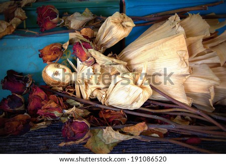 old corn husk doll with dry roses stock photo 191086520 old corn husk doll with dry roses stock photo 191086520