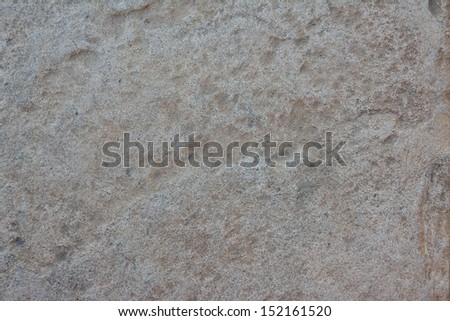 Image of a decorative stone floor at the entrance of a building