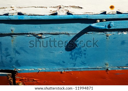 Close-up of a boat\'s peeling paint