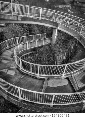 Black and white steel pedestrian spiral ramp