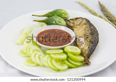 Fried Mackerel fish,spicy sauce ,and fried vegetable