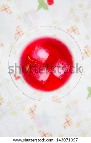 Red juice on top view on table