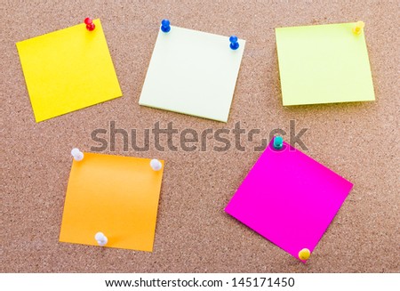 Cork board and colorful paper notes