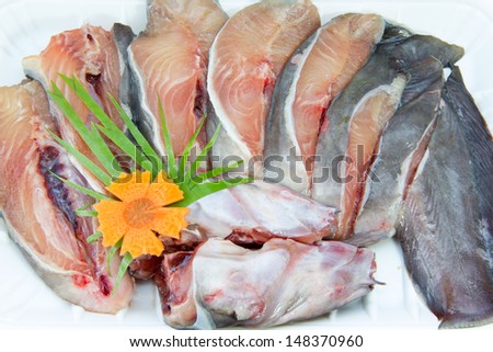 Slice catfish raw food from supermarket waitting cook on a plate