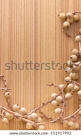 Dry flowers frame on wooden background with copy space
