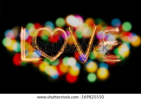 Valentines Day -  Love sparkler firework light alphabet with bokeh light