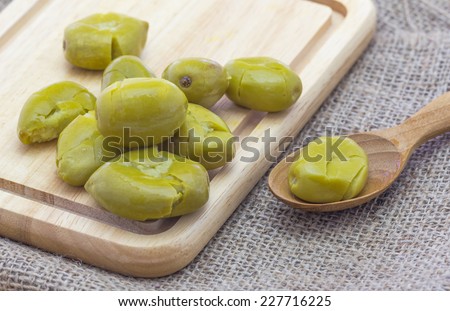 olives fruits with salt and ground red or green peppers (Preserve fruit)