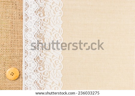 White Ornamental Lace with sewing button over fabric design for border or background
