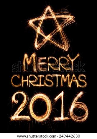 Merry Christmas 2016 word written with Sparkle firework on black background