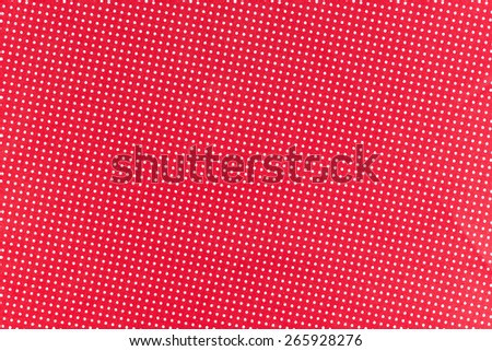 Seamless White dots over red Polka dot fabric background and texture