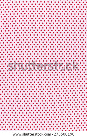 Seamless red dots over white Polka dot fabric background and texture