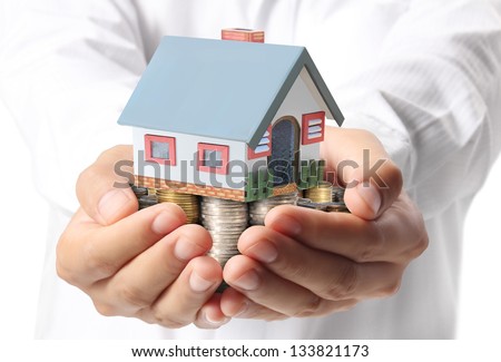 businessmen Protect Your House in hand
