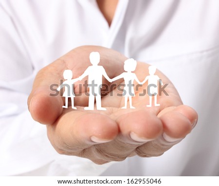 ideas,paper family in the hand