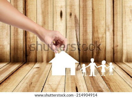 property insurance concept , man protect model of the house