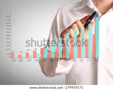 Man hand drawing a chart show