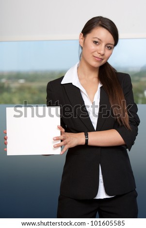 Happy young woman holding white card sign - Add your text