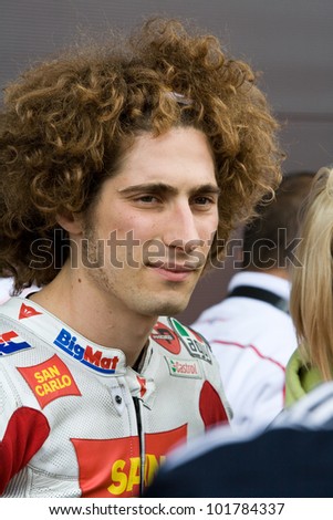 SILVERSTONE, ENGLAND - CIRCA 2011: Italian motorcycle racer Marco Simoncelli meets with fans during the British MotoGP in Silverstone England, circa 2011.