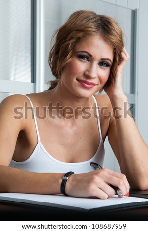 Young professional woman smiling looking at camera