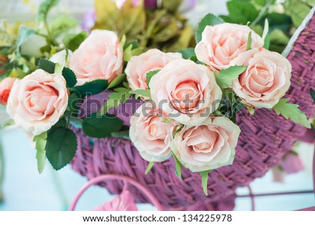 Artificial rose in the basket