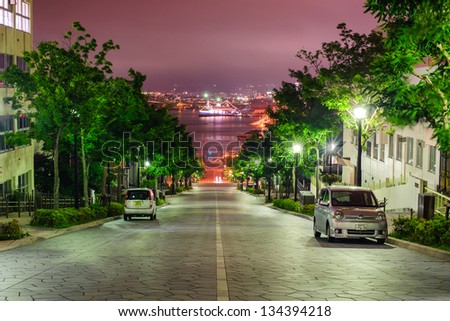HAKODATE - AUGUST 3 : View of the road to the harbor at night in Hakodate, Japan on August 3, 2012. Hakodate was Japan\'s first city whose port was opened to foreign trade in 1854.