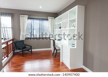 Bookshelf and the desk in modern room