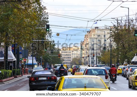 ATHES - GREECE, DECEMBER 23 2012: Rush hour in Athens City at Panepistiniou Street