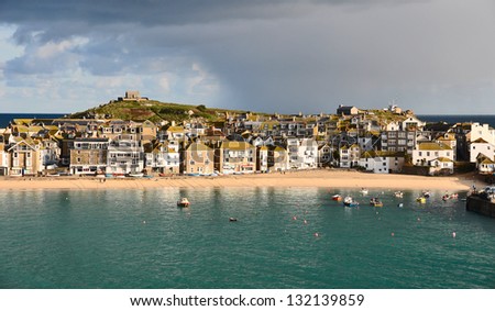 St Ives harbour in Cornwall UK with the quaint cottages situated on what is referred to as the Island but which is in fact an peninsula.