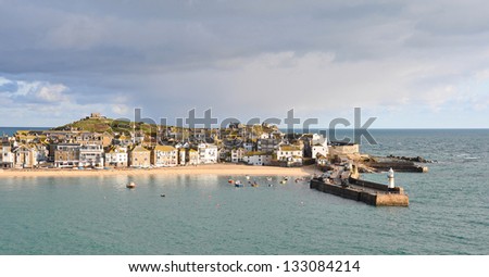 St Ives harbour in Cornwall UK with the quaint cottages situated on what is referred to as the Island but which is in fact an peninsula.