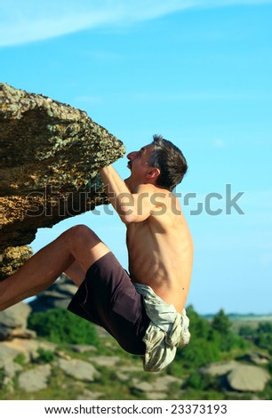Man rock climbing. Altay, Russian Federation